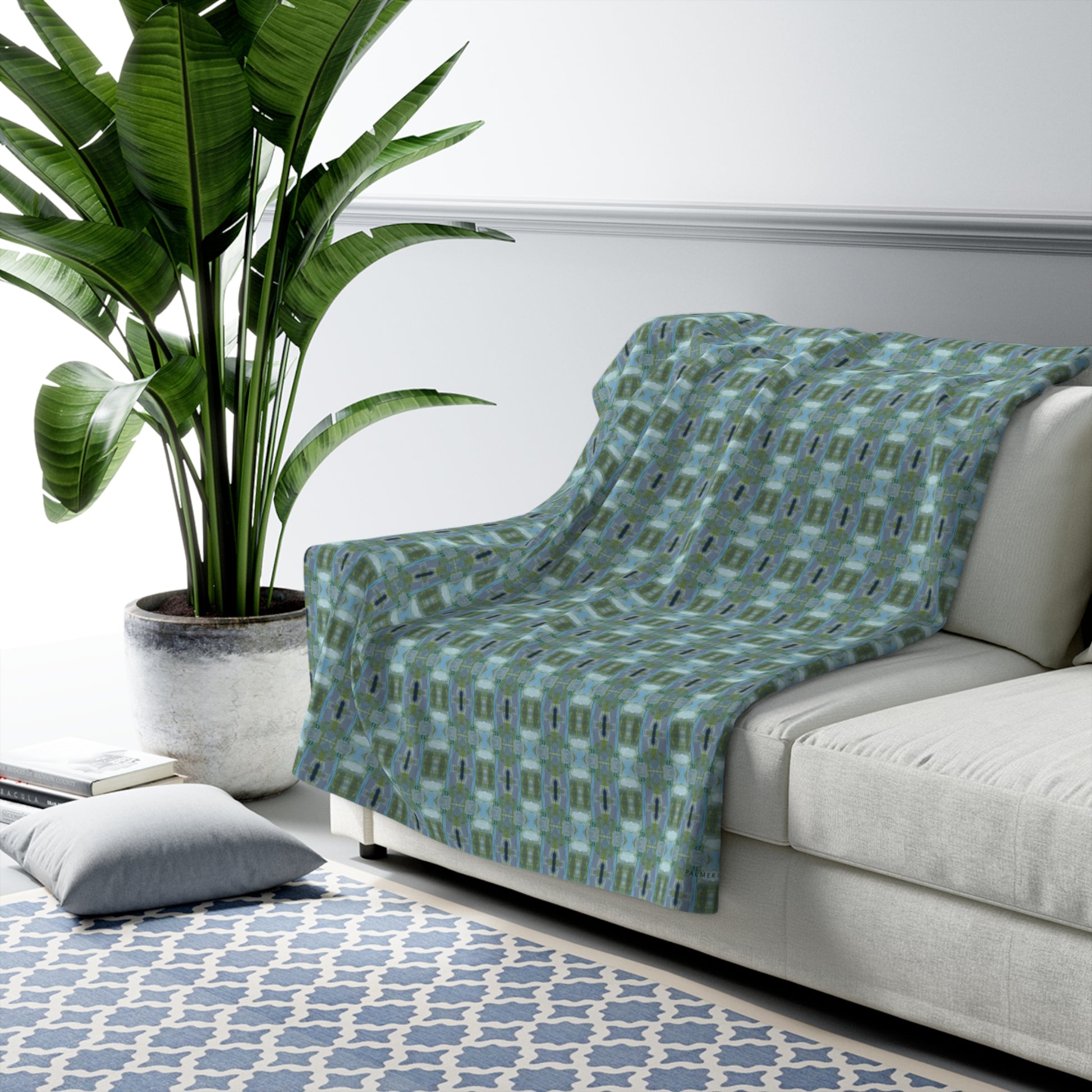 Unbelievably fluffy and warm - our high quality cozy fleece blanket in blue and green geometric pattern  is impossible to leave behind. The perfect size for snuggling on the couch, by the fireplace or at outdoor events.
.: Made with 100% polyester that's 1/8'' (3mm) thick for extra warmth and a feel that is supremely soft to the touch. 
.: All fleeces come with a one-sided print and a velvety, plush backside for extra coziness. 
.: Available in 2 sizes - 50 x 60 throw size and 60 x 80 twin bed size
