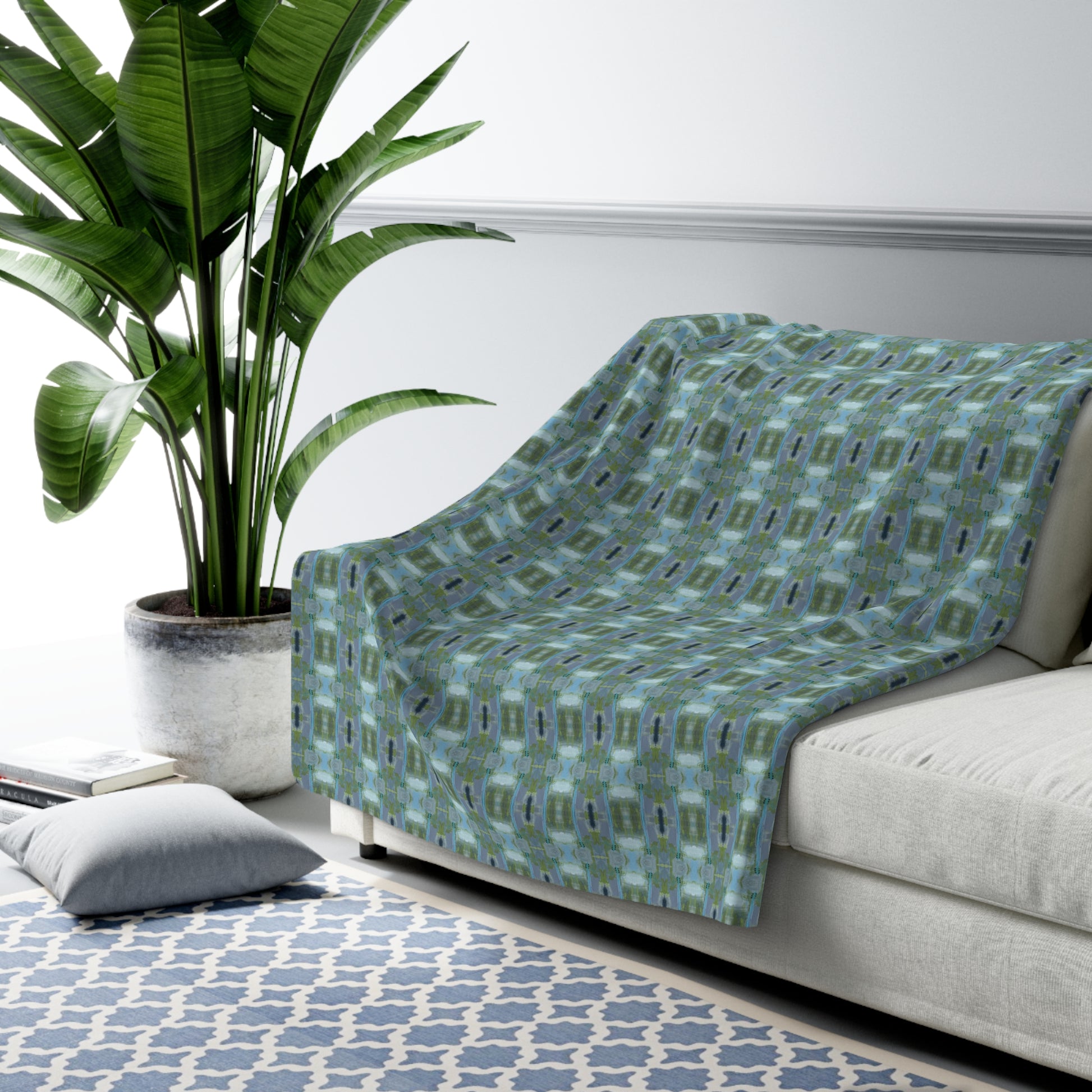 Unbelievably fluffy and warm - our high quality cozy fleece blanket in blue and green geometric pattern  is impossible to leave behind. The perfect size for snuggling on the couch, by the fireplace or at outdoor events.
.: Made with 100% polyester that's 1/8'' (3mm) thick for extra warmth and a feel that is supremely soft to the touch. 
.: All fleeces come with a one-sided print and a velvety, plush backside for extra coziness. 
.: Available in 2 sizes - 50 x 60 throw size and 60 x 80 twin bed size