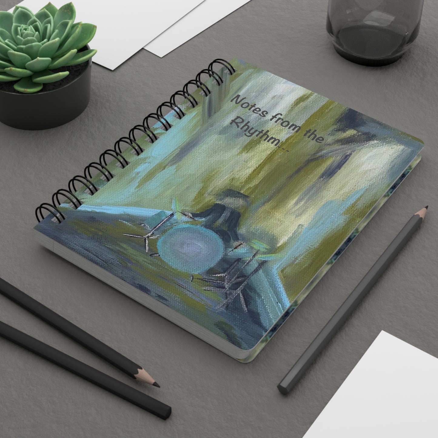 Rhythmic Notes from the Drum Kit! Write down your dreams in style in our spiral-bound journal featuring "Time Out". Our notebooks feature a durable thick gloss laminated protective cover, with pattern repeat created from the original artwork on the inside front and back covers. Made in the USA! Journal comes in 5x7 size with 150 pages of lined paper with preforated eadge for easy tear removal! .: Front, back and inside cover print .: 150 lined pages (75 sheets) .: Glossy laminated cover