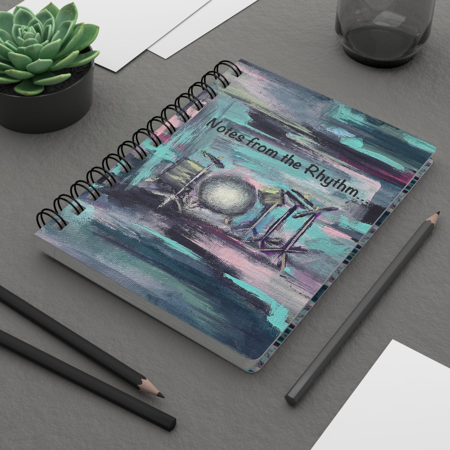 Rhythmic Notes from the Drum Kit! Write down your dreams in style in our spiral-bound journal featuring "Searchlight". Our notebooks feature a durable thick gloss laminated protective cover, with pattern repeat created from the original artwork on the inside front and back covers. Made in the USA! Journal comes in 5x7 size with 150 pages of lined paper with preforated eadge for easy tear removal! .: Front, back and inside cover print .: 150 lined pages (75 sheets) .: Glossy laminated cover