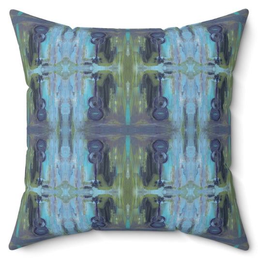 A square-shaped throw pillow with a pattern featuring abstract blue and green tones and the silhouette of an acoustic guitar.