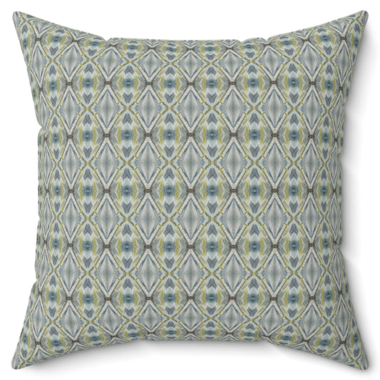 A square-shaped throw pillow with a geometric lattice pattern in a color scheme that includes green and blue, with a soft poly velvet cover.