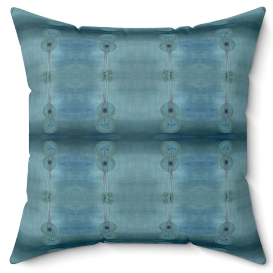A square-shaped throw pillow with a blue patterned design, featuring a concealed zipper and a knife edge finish.