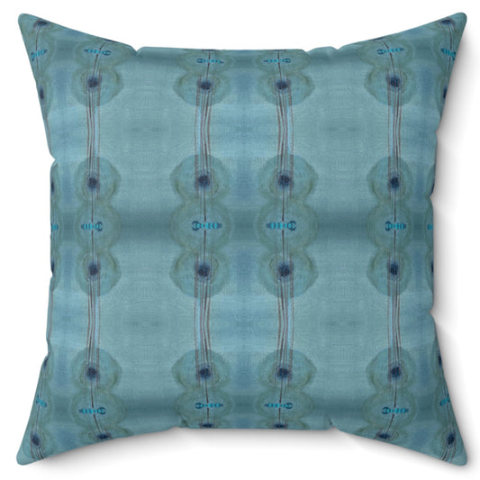 A square-shaped throw pillow with a blue and white geometric pattern, featuring a concealed zipper and a poly velvet cover.
