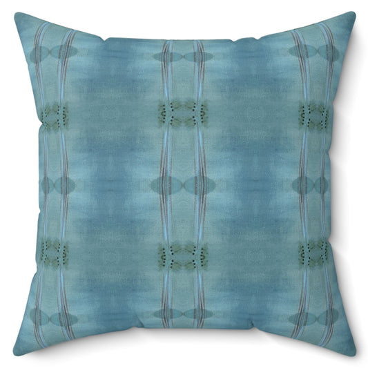 A square-shaped throw pillow with a two-sided blue and white geometric pattern, featuring a concealed zipper and a knife edge finish.