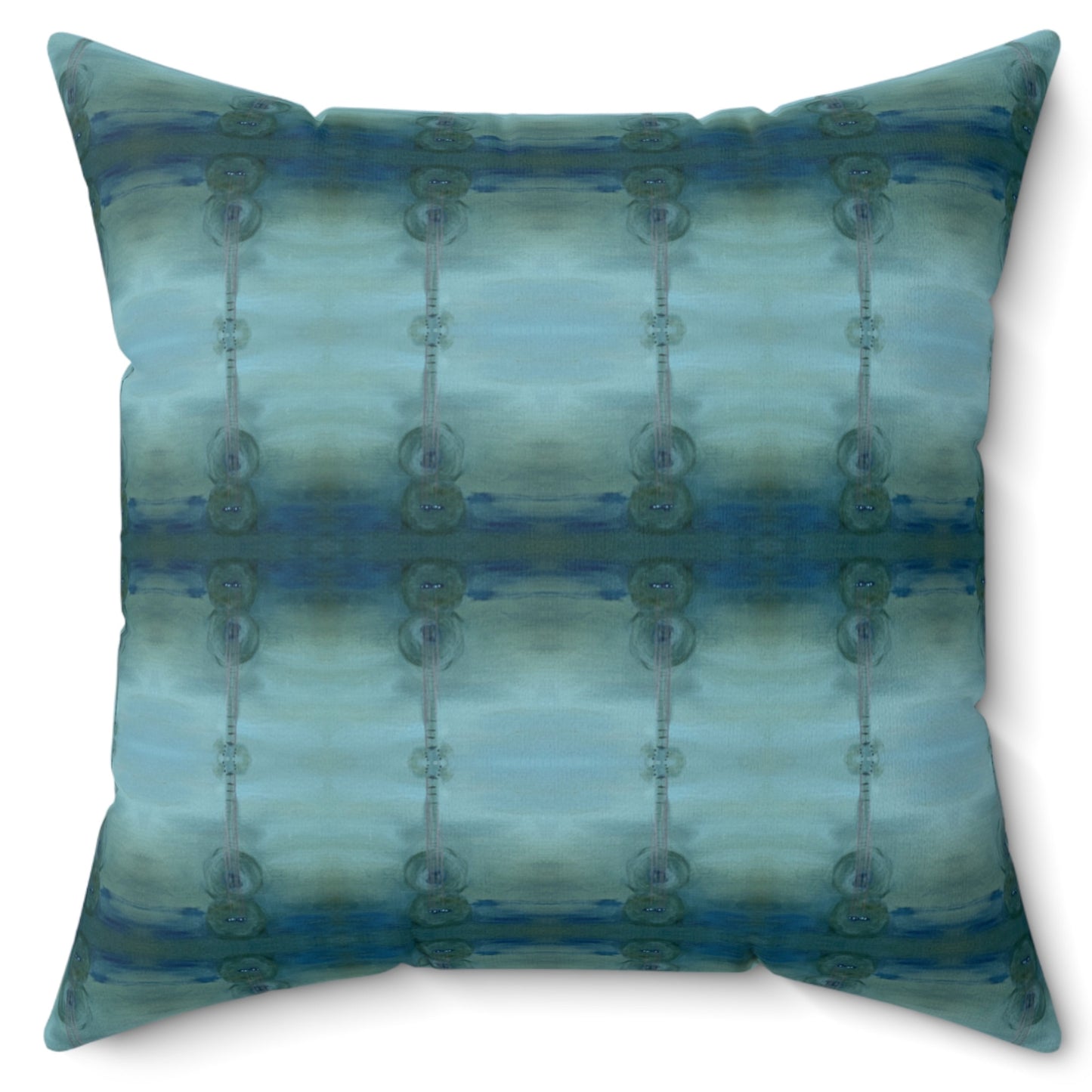 A square-shaped throw pillow with a pattern that resembles an acoustic guitar, featuring shades of blue and green.