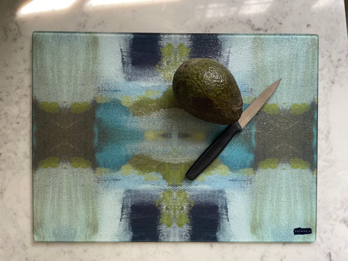 Artist designed charcuterie cutting boards featuring original artwork patterns by Karen Palmer in an elevated kitchen setting