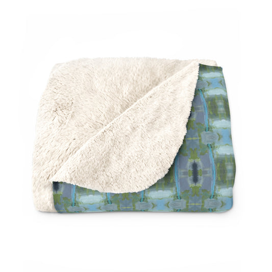 Unbelievably fluffy and warm - our high quality cozy fleece blanket in blue and green geometric pattern  is impossible to leave behind. The perfect size for snuggling on the couch, by the fireplace or at outdoor events.

.: Made with 100% polyester that's 1/8'' (3mm) thick for extra warmth and a feel that is supremely soft to the touch. 
.: All fleeces come with a one-sided print and a velvety, plush backside for extra coziness. 
.: Available in 2 sizes - 50 x 60 throw size and 60 x 80 twin bed size