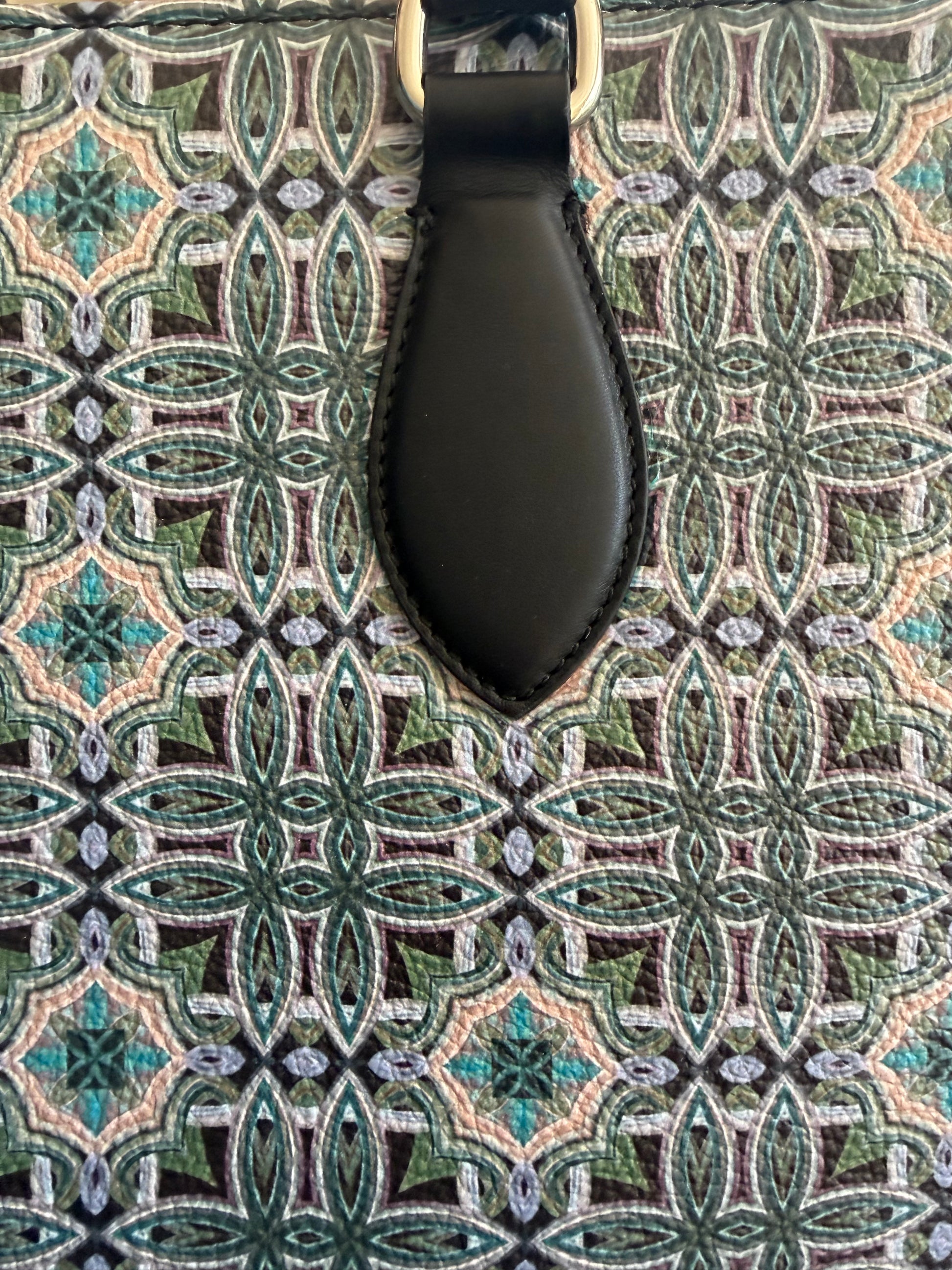 Close up detail of the Atelier Tote showcasing fine art pattern printed on soft full-grain Nappa leather, highlighting texture, craftsmanship and luxury finish.