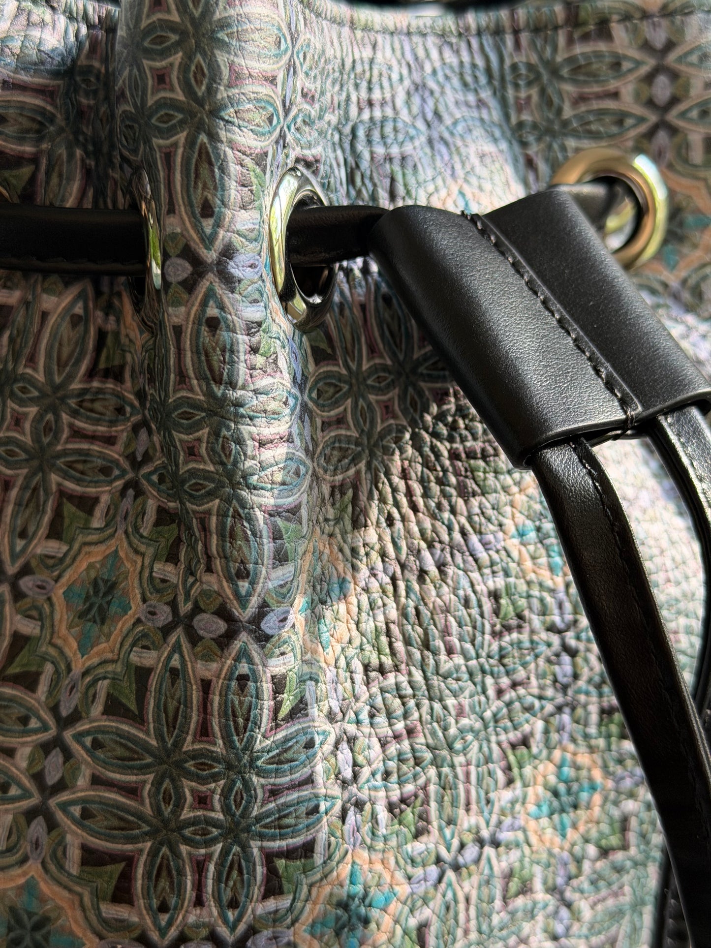 Close up detail of Maison Bucket Bag featuring rich texture and custom textile pattern created from original fine art painting.