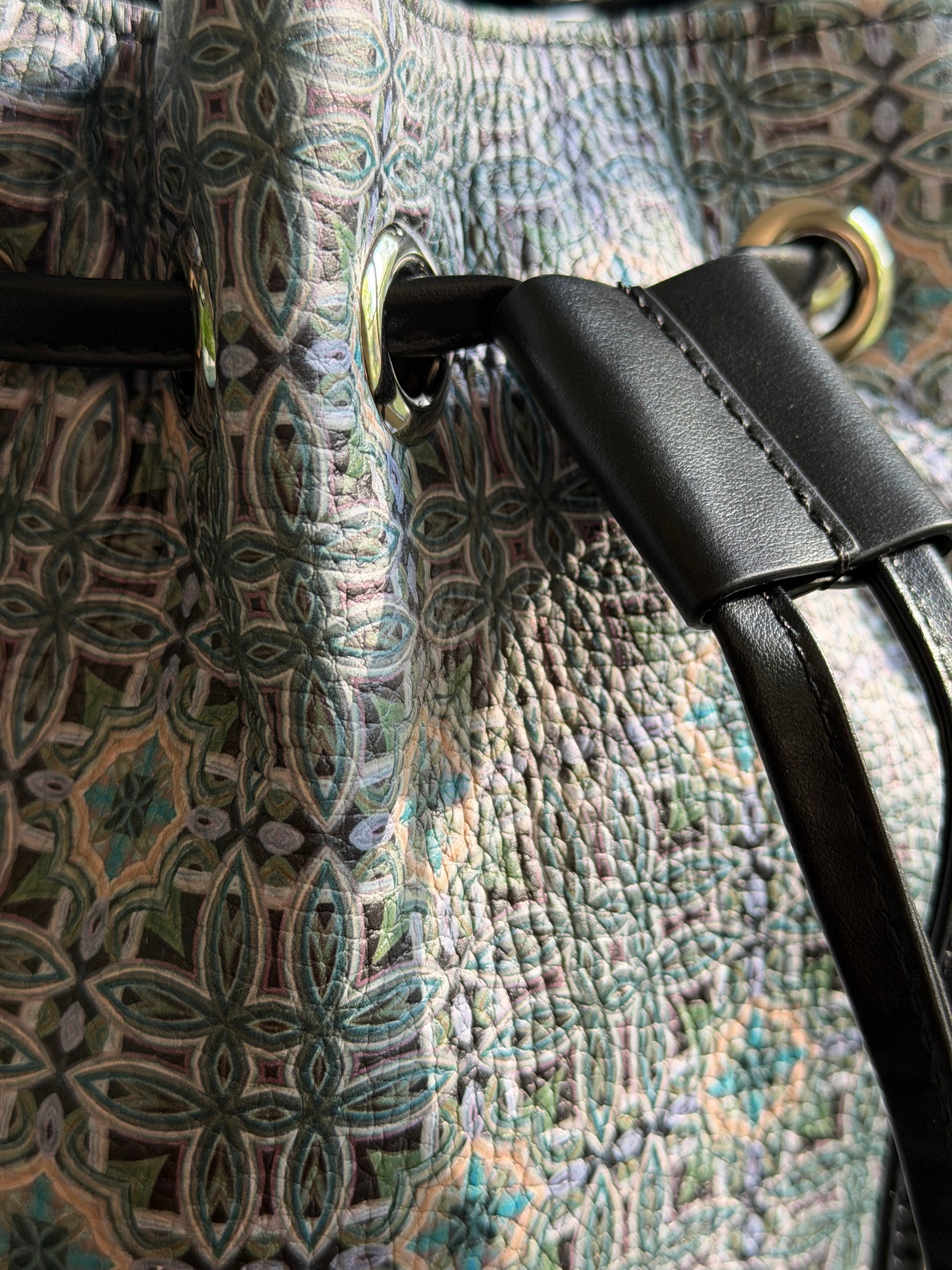 Close up detail of Maison Bucket Bag featuring rich texture and custom textile pattern created from original fine art painting.
