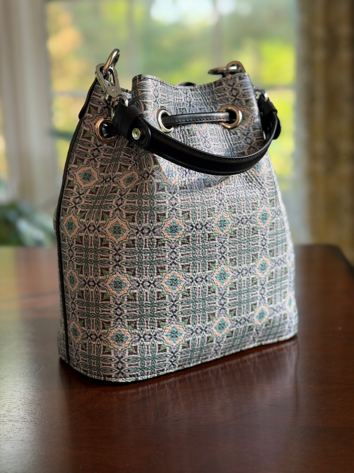 Rear View of the Maison Bucket Bag limited Edition.   100% Nappa Leather for refined texture and quiet luxury.