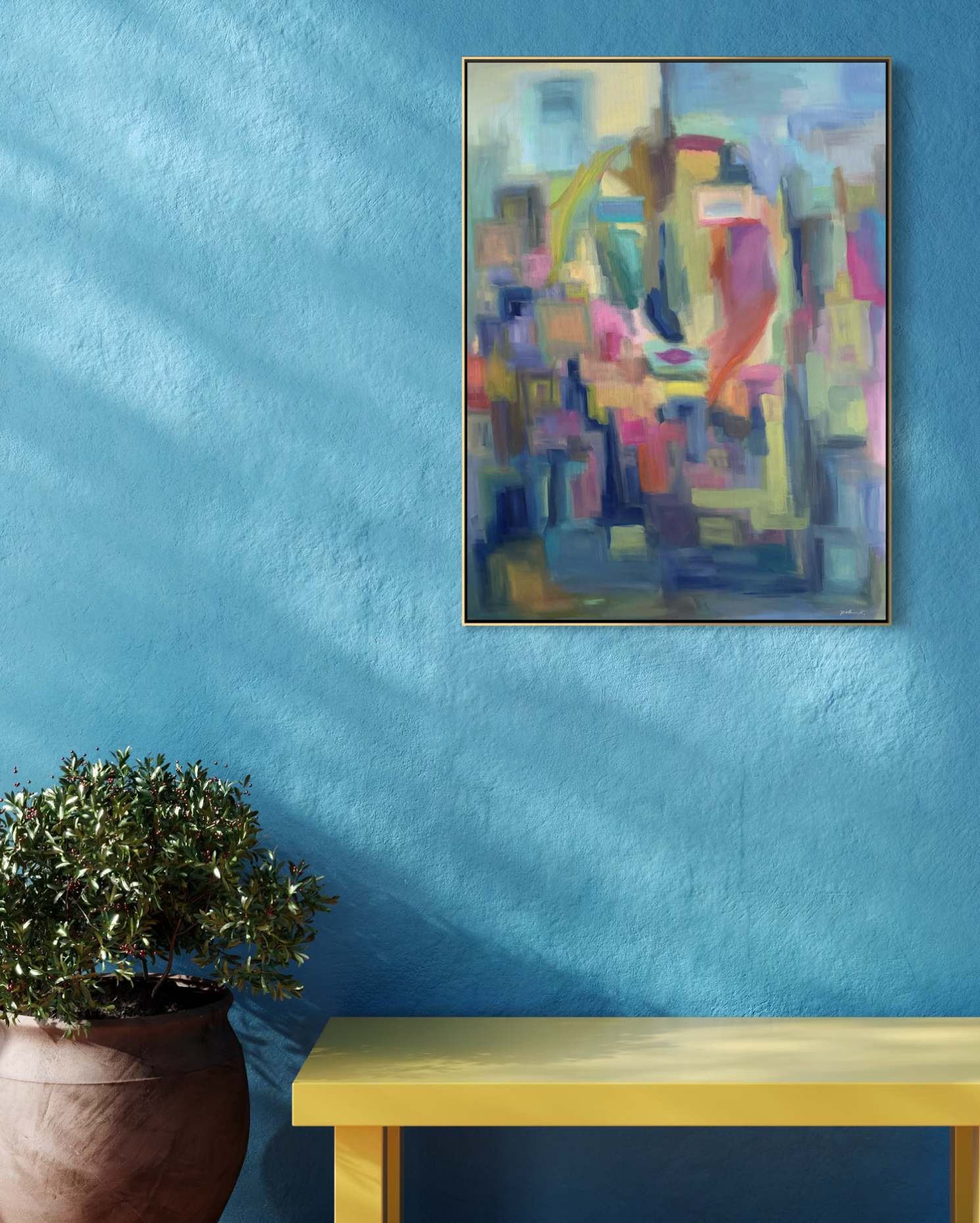 Summer’s Kiss is an original 40 x 40 contemporary landscape painting that brings warmth, color, and atmosphere to sophisticated interiors.  Shown here in a thoughtfully designed living space, this original fine art painting creates a striking foal point while complementing modern, transitional, and luxury home decor.  Inspired by the sensory richness of summer and viewed through a reflective pane of glass, Summer’s Kiss invites moments of nostalgia, connection, and a quiet reflection. 